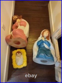 Blow molds Mary, Joseph, and baby Jesus. General foam company