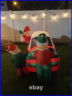 Gemmy Airblown Inflatable 8ft Santa Racer Lighted Christmas Race Car Santa Claus