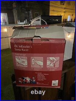 Gemmy Airblown Inflatable 8ft Santa Racer Lighted Christmas Race Car Santa Claus
