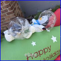 Gemmy Inflatable Santa and Penguins On Rocketship READ