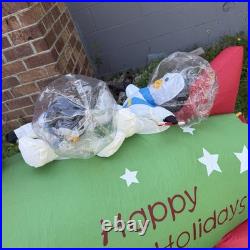 Gemmy Inflatable Santa and Penguins On Rocketship READ