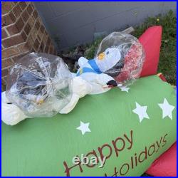 Gemmy Inflatable Santa and Penguins On Rocketship READ