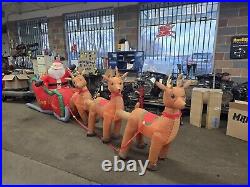 HOME ACCENTS SELF INFLATABLE 16 ft LIGHTED SANTA AND SLEIGH WITH REINDEER GIANT