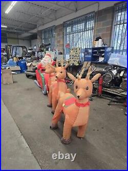 HOME ACCENTS SELF INFLATABLE 16 ft LIGHTED SANTA AND SLEIGH WITH REINDEER GIANT