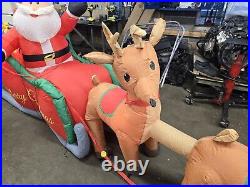 HOME ACCENTS SELF INFLATABLE 16 ft LIGHTED SANTA AND SLEIGH WITH REINDEER GIANT