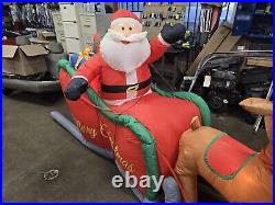 HOME ACCENTS SELF INFLATABLE 16 ft LIGHTED SANTA AND SLEIGH WITH REINDEER GIANT