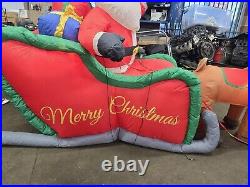 HOME ACCENTS SELF INFLATABLE 16 ft LIGHTED SANTA AND SLEIGH WITH REINDEER GIANT