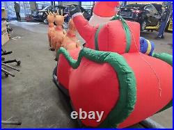 HOME ACCENTS SELF INFLATABLE 16 ft LIGHTED SANTA AND SLEIGH WITH REINDEER GIANT