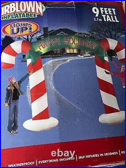 New Gemmy Christmas Airblown Inflatable Happy Holiday Candy Cane Archway- 9ft